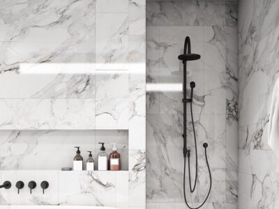 This bathroom by Renovahouse features a marble finish with a black vein on a white tile. very sophisticated and elegant bathroom in Sydney NSW Australia