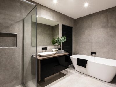 Modern bathroom with great matte tiles free standing bathtub and elegant vanity plus shower area and bathtub